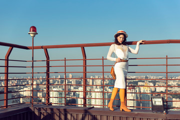 Stylish young girl in an autumn look