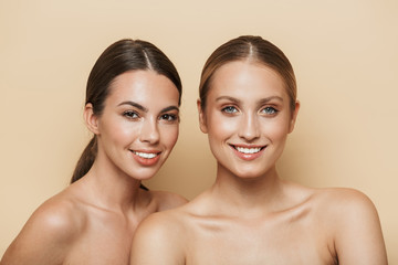 Cheery beautiful blonde and brunette women