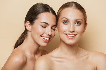 Cheery beautiful blonde and brunette women