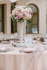 Luxury wedding table with beautiful flowers. pink stylized