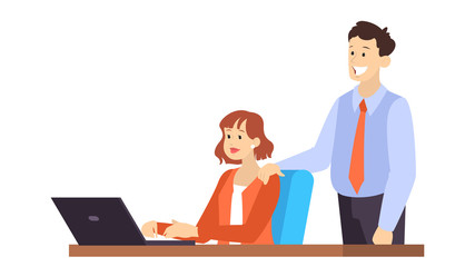 Young woman sitting at the desk and working on computer