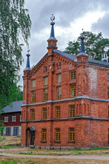 Well-preserved example of red brick buildings of former Verla Groundwood and Board Mill - Museum. Finland.