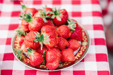 Juicy and tasty ripe strawberry on a dining table. Beautiful and tasty sweet berry