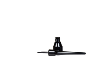 Black liquid pencil, eye makeup brush. Isolated