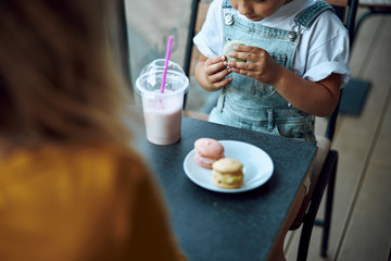 Tasty cookie in hands of child stock photo