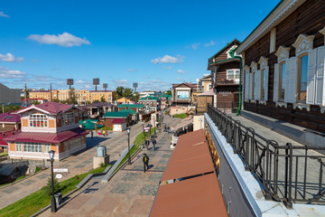 IRKUTSK, RUSSIA - SEPTEMBER 08, 2019:130 Kvartal quarter (Irkutsk Sloboda) is a specially created area of historic buildings in the center of Irkutsk, Russia.
