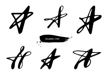 Calligraphic stars set. Black and white hand drawn style