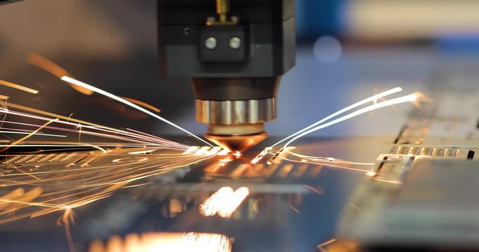 CNC Laser cutting of metal, modern industrial technology.