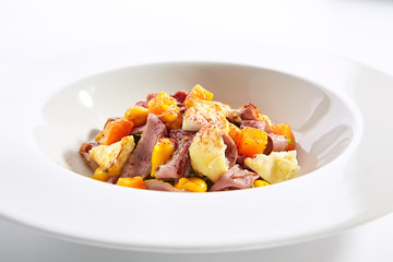 Duck fillet and pumpkin salad closeup
