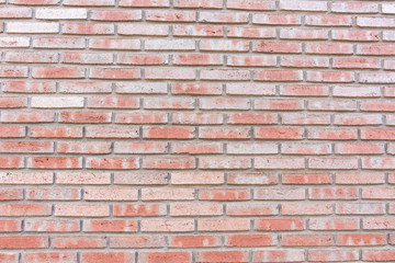 wall made of orange bricks. For texture or background