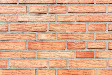 wall made of orange bricks. For texture or background