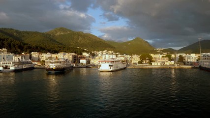 Ferryboat without people moored on the Mediterranean coastline in Greece. 4K