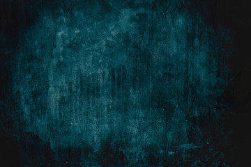 dark blue grungy wall background or texture