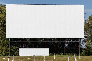 Old Time Drive-In Movie Theater with blank white screen for copy space or advertising