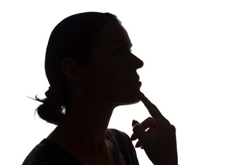 Portrait of young woman, pensive, thinking side view - silhouette, isolated