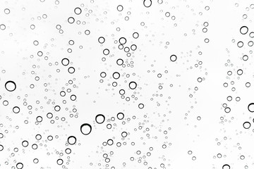 Rain drops on window glasses surface Natural Pattern of raindrops. Natural pattern of raindrops on white background for your design.