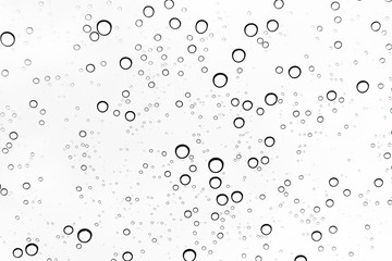 Fototapeta na wymiar Rain drops on window glasses surface Natural Pattern of raindrops. Natural pattern of raindrops on white background for your design.
