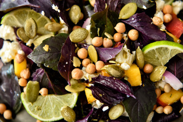 Tasty fresh salad with lime, closeup