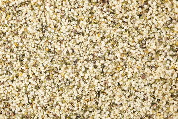 Hemp seeds background, top view