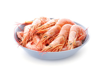Bowl with tasty shrimps on white background