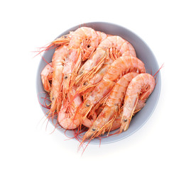 Bowl with tasty shrimps on white background