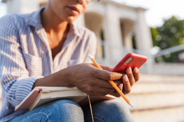 Attractive young african woman wearing casual clothing