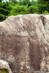 Buddha statue carved into the rock in Gyeongju-si, South Korea.