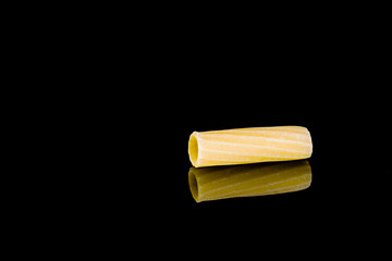 Italian pasta raw rigatoni reflection isolated on black background - Immagine