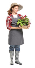 Portrait of female gardener on white background