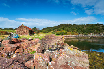 An old croft and a boat on the shores of Loch Torridon © Helen Hotson
