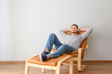 Man with headphones relaxing at home