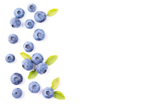 Blueberries with leaves isolated on white background, top view
