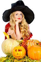 cute witch with pumpkins