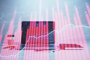 Forex graph hologram with desktop office computer background. Double exposure. Concept of financial analysis.