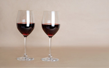 Red wine in glasses. Two glasses of red wine.