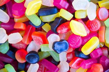 Wallpaper of colored candies. Close up. Top view. Liquorice