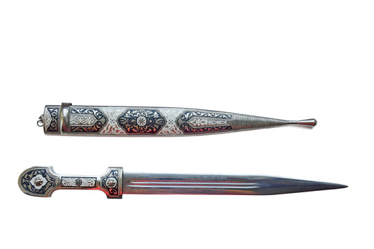 Antique oriental dagger with sheath  isolated on a white background with copy space