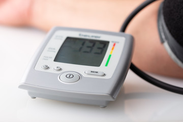 Man measuring his blood pressure