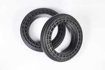 A pair of new thrust bearings absorber car on a gray background. The concept of new car parts and car service