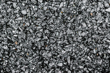 Background texture of rough asphalt Dark black Asphalt surface,top view.