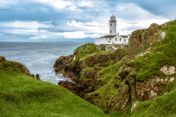 Fototapeta na wymiar Fanad Lighthouse Donegal Ireland North Coast clouds seascape