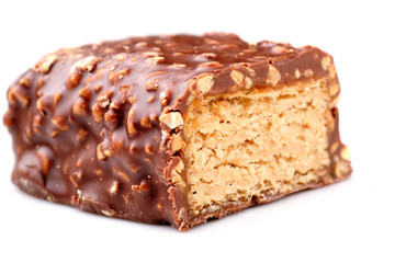 Chocolate candy with nuts close up.