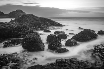 Obraz premium Giants Causeway Northern Ireland beautiful morning view sunlight long exposure Antrim Coast sunset