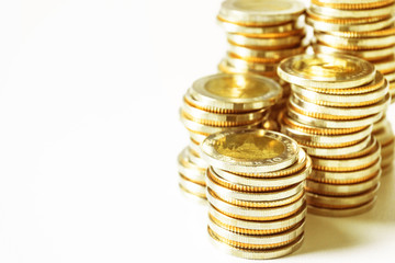 Coins stacked on each other in different positions. Saving money and account finance bank business concept. Business Finance and Money concept,Save money for prepare in the future.time is money concep