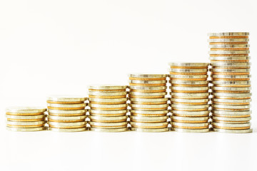 Coins stacked on each other in different positions. Saving money and account finance bank business concept. Business Finance and Money concept,Save money for prepare in the future.time is money concep