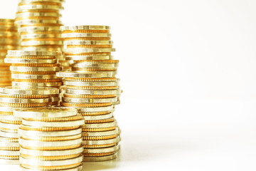 Coins stacked on each other in different positions. Saving money and account finance bank business concept. Business Finance and Money concept,Save money for prepare in the future.time is money concep