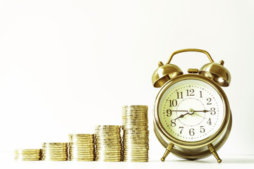 Coins stacked on each other in different positions. Saving money and account finance bank business concept. Business Finance and Money concept,Save money for prepare in the future.time is money concep