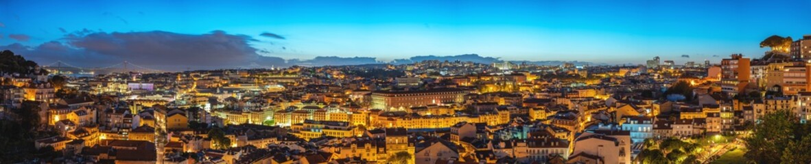 Fototapeta na wymiar Lisbon Portugal aerial view night panorama city skyline at Lisbon Baixa district