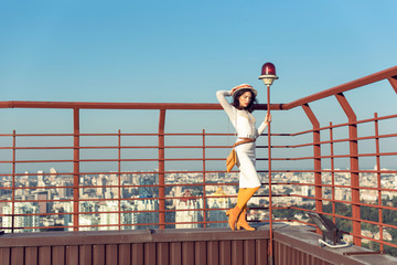 Stylish young girl in an autumn look
