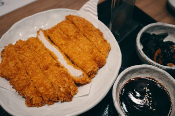 Tonkutsu or Japanese crispy pork with sauce